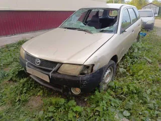 Mazda Familia 2002 года выпуска, номер двигателя YD22 056073A, ПТС 65 ТЕ 275821, государственный регистрационный знак МО83РА65.