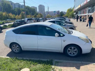 Toyota Prius, 2006, год выпуска: 2006, кузов: NHW207573629, цвет: белый. В залоге у АО "ОТП Банк"