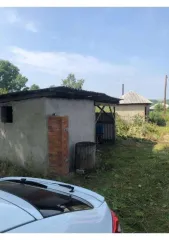 Земельный участок, кадастровый номер 42:06:0114003:151, Кемеровская область, Ленинск-Кузнецкий район, поселок Березовка, улица Озерная, 73. Здание - дача, кадастровый номер 42:06:0114003:153, Кемеровская область, Ленинск-Кузнецкий район, поселок Березовка, улица Озерная, дом 73.