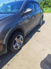 Renault Logan 2019 года, 82 лс, 100000 км. Автомобиль RENAULT LOGAN 2019 года выпуска, VIN: X7L4SRLVG63029599; цвет: коричневый, ПТС: 77 РВ 479884, г/н: В787ВК164, изготовитель (страна): РОССИЯ, тип двигателя: бензиновый, мощность двигателя, л. с. (кВт): 82 (60,5), рабочий объем двигателя, куб. см…