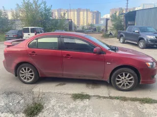 Mitsubishi Lancer 2008 года выпуска, красного цвета, VIN: JMBSRCY2A8U011235. Пробег 254 000 км. В неисправном техническом состоянии: требуется замена электро рулевой рейки, замена или ремонт АКПП (не работает 2 передача), замена цепи, замена ГРМ и роликов, замена клапанов и шатунов, неисправна…