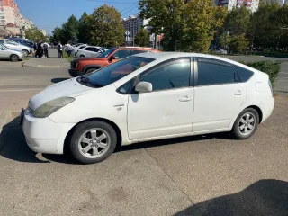 Toyota Prius, 2006, год выпуска: 2006, кузов: NHW207573629, цвет: белый. В залоге у АО "ОТП Банк"