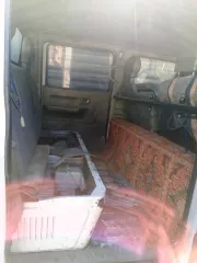 Транспортное средство Митсубиси Кантер выпуска 1998 года,  Грузовой бортовой, VIN отсутствует, цвет белый/серый, гос. рег. знак К161УХ75