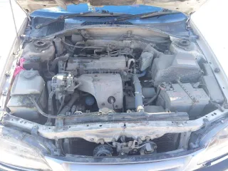 Легковой автомобиль Toyota Caldina 1998 года выпуска, государственный номер А162АМ49.
