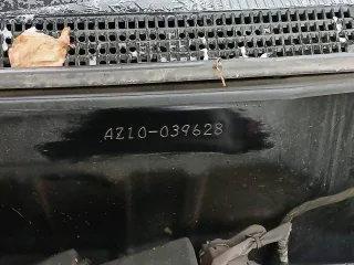 Nissan Cube 2000 года, госномер Н845МУ03, черный цвет. VIN: AZ10039628, двигатель бензиновый 1.3 л (85 л.с.), снаряженная масса 980 кг, полная масса 1200 кг. Производство: Япония.