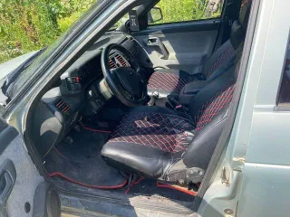 ВАЗ 2110 1977 года, VIN XTA21100010268233, цвет серебристо-желто-зеленый, мощность двигателя 72 л.с.