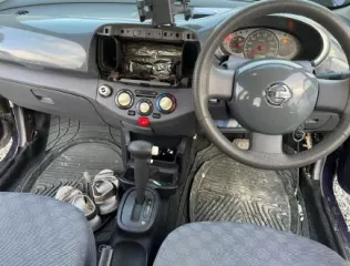 Автомобиль Nissan March, год выпуска 2002, VIN AK12031344, цвет кузова сиреневый.