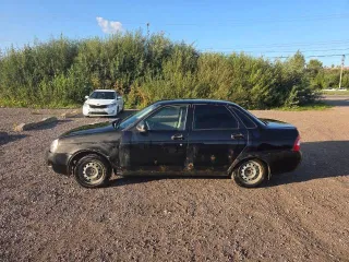 Lada Priora, 2012 года выпуска, 97,9 лс, 284000 км. Легковой автомобиль, VIN: XTA217030D0402038, 97,9 л.с., рабочий объем двигателя 1596 куб. см., разрешенная максимальная масса 1578 кг., масса без нагрузки 1163 кг., цвет: сине-черный, г/н: В943РВ69, пробег примерно 284 000 км.