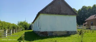 Нежилое здание (здание библиотеки),  КН 48:06:1570203:14, 1965 года постройки, площадью 79,3 кв. м,  расположенное на земельном участке, КН 48:06:1570203:15, площадью 618 кв. м, местоположение: Липецкая область, Долгоруковский округ, с.Войсковая Казинка, ул.Центральная, д.16 Местоположение…