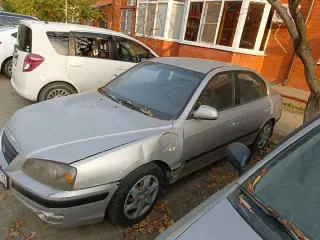 Hyundai Elantra 1.6 GLS 2004 легковой автомобиль, VIN: КМНDN41ВР4U907192, 2004 г.в., номер кузова: КМНDN41ВР4U907192, цвет кузова: серебристый, мощность: 105 л.с., госномер М062ТН 93. Автомобиль не на ходу, требуется ремонт двигателя. По кузову имеются многочисленные сколы, царапины, вмятины…