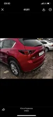 Mazda CX-5 2019 года выпуска, цвет красный, VIN JM3KFBDM3K1626355, государственный номер О510РН29. Состояние: скол краски на задней правой двери, скол на заднем бампере слева. Вид транспорта: легковой.