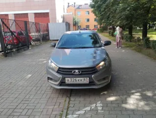 LADA Vesta 2018 года, цвет кузова серый. VIN: XTAGFL110JY200211. Мощность двигателя 106.1 л.с. (78 кВт).