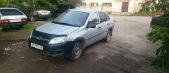 Lada Granta 2014 года, 87 л.с., пробег 144 000 км. Двигатель бензиновый 1.6 л (1596 см³), механическая КПП. Состояние удовлетворительное. Местонахождение: Архангельская область, п. Лойга. VIN: XTA219060EY095703.