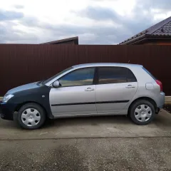 Toyota Corolla 2003 года выпуска. VIN: SB1KZ22EX0E074066.