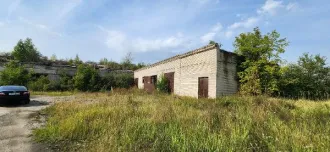 Здания гаража-ангара 547,9 кв.м, главного корпуса 1855,4 кв.м, КПП 28,9 кв.м, автогаража 2513,1 кв.м с земельным участком 26235 кв.м, Курганская область Объекты недвижимого имущества, расположенные на земельном участке, по адресу: Курганская область, г. Курган, ул. Омская, д. 179В Объекты…
