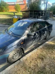 Ford Focus, 2004 год, VIN: X9FFXXEEDF4G26470, госномер: Н619МК10, модель двигателя: 4G26470, мощность: 72.1 кВт / 98.0 л.с., объем двигателя: 1599 см³, цвет кузова: Темно-синий.