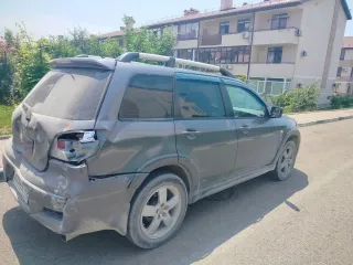 MITSUBISHI Outlander 2006, автомобиль марки MITSUBISHI модель Outlander 2006 г.в. VIN-номер JMBXNCU2W6U006420. Имущество является предметом залога ПАО «СБЕРБАНК».