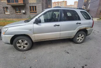 KIA Sportage 2009 года выпуска, VIN XWEKG812AA0001237.