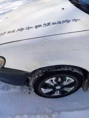 Легковой автомобиль, марка: Toyota, модель: Corolla, год изготовления: 1998, цвет: белый, г/н: К210УА28, двигатель №: 5Е-1325736.