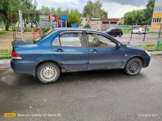 Mitsubishi Lancer, 2005 г.в., VIN: JMBSRCS3A5U009978