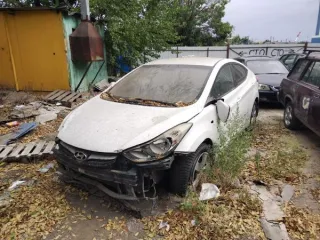 Hyundai Elantra 2012 года выпуска, государственный регистрационный знак Р219ОХ/761, VIN KMHDG41CBDU741475. Кузов белого цвета, с признаками эксплуатации, видимыми дефектами и механическими повреждениями, возможны скрытые повреждения и дефекты.