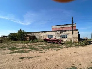 Здание МТМ (МТМ - машино-тракторная мастерская) с пристройкой, к/н 34:13:150001:396, площадь 918,3 кв.м, адрес: Волгоградская область, Котельниковский район, ст-ца Нагавская, №310, год постройки 1992, состояние удовлетворительное