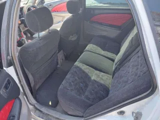 Легковой автомобиль Toyota Caldina 1998 года выпуска, государственный номер А162АМ49.