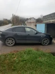 Mazda 3 2005 года выпуска, черный цвет. VIN: JMZBK12Z561296176, госномер: М815АС126. Мощность двигателя 77 л.с. (105 кВт), рабочий объем 1598 куб. см.