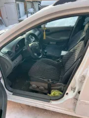 Шевроле Лачетти 2012 года выпуска, VIN XUUNF356JC0014008, госномер С977ХТ55. Учтены коррозийные повреждения, потертости и царапины на ЛКП. Задняя правая фара разбита. На лобовом стекле трещина. Требуется химчистка салона.