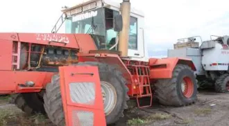 Колесный трактор К-701 1991 года выпуска, госномер 4803КО45, заводской номер 9100725, двигатель 00424, желтый цвет.