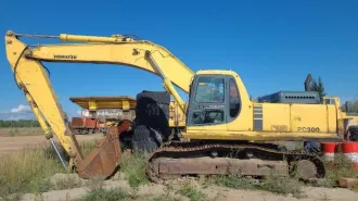 Komatsu PC-128UU-1E Экскаватор гос. рег. знак 6486ММ49