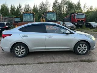 Hyundai Solaris 2017 года выпуска, VIN Z94K241BAJR057601, цвет: Серебристый. Залог в пользу АО «Экспобанк».