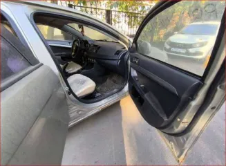 Mitsubishi Lancer 2011 Легковой седан Mitsubishi Lancer 1,5, VIN: JMB5NCY2ABU006835, год выпуска: 2011, цвет: бежевый, тип двигателя: бензиновый, мощность двигателя: 109 л.с. (80,2 кВт), объем двигателя: 1499 куб.см., экологический класс: четвертый. По периметру автомобиля наблюдаются очаги…