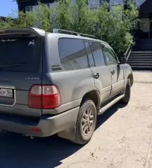 Lexus LX470 2000, 2000 г.в., г/н Н262КР14, цвет СЕРЫЙ/ТЕМНО-СЕРЫЙ, VIN JT6HT00W1Y0117569. Вид транспорта: наземный. Год выпуска: 2000. VIN номер: JT6HT00W1Y0117569. Марка: Lexus. Модель: LX470.