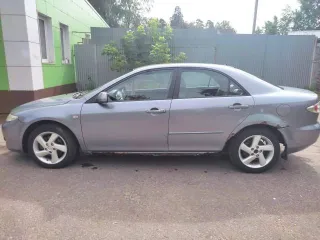 Mazda 6 2004 года, VIN JMZGG12F551248199, госномер Р990РМ177. Мощность 141 л.с. (104 кВт), объем двигателя 1999 куб. см. Масса без нагрузки 1260 кг, разрешенная максимальная масса 1830 кг. Модель двигателя LF 365249, номер кузова 1248199. Цвет кузова темно-серый, тип двигателя бензиновый…
