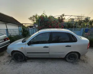 Автомобиль LADA Kalina 2008 года выпуска, VIN XTA11184080173158, государственный номер Т 091 ОО 93. Кузов серебристого цвета, тип кузова - легковой седан. Двигатель бензиновый, модель 11194, номер 2244630, объем 1390 см³, мощность 89,1 л.с. (65,5 кВт).