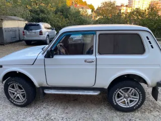 LADA 4x4 2012, VIN: XTA212140D2105709, цвет кузова: ярко белый. Есть конструктивные изменения.