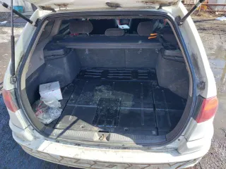 Легковой автомобиль Toyota Caldina 1998 года выпуска, государственный номер А162АМ49.