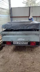 Прицеп к легковому автомобилю KMZ 828421   цвет: серебристый, серый, год выпуска 2015, VIN   XVF828421F0005935