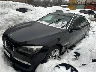 BMW 750Li xDrive 2011 года выпуска. VIN: X4XKC81120C572940.