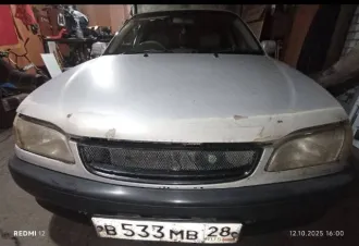 Toyota Corolla 1998 года выпуска. Госномер В533МВ28. VIN кузова AE1145019939. Двигатель M381011, объем 1.6 л (1587 см³), мощность 110 л.с., автоматическая коробка передач, передний привод. Цвет светло-серый. Пробег более 450 тыс. км. Состояние: на ходу, но требуется ремонт. Необходим ремонт кузова…