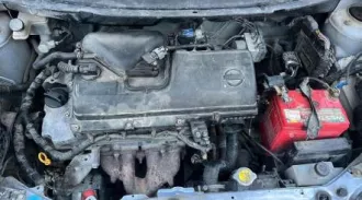 Автомобиль Nissan March, год выпуска 2002, VIN AK12031344, цвет кузова сиреневый.