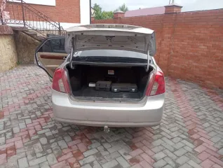 Автомобиль Daewoo Lacetti, 2003 г.в., государственный регистрационный знак Н501ХС55, VIN: KLANA19VD3K892177 цвет серебристый.