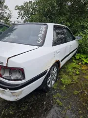 Mazda 323, год выпуска не установлен, годные остатки автомобиля марки «Мазда 323», регистрационный знак иностранного государства АН6785ОВ (передняя табличка фактически отсутствует). Цвет кузова – белый. Год выпуска и VIN-номер не установлены. Информация о регистрационном учете ТС на территории РФ…