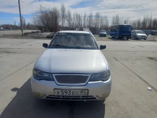 Daewoo Nexia 2009, модель: Нексия, год изготовления: 2009, цвет: перламутрово-серебр
