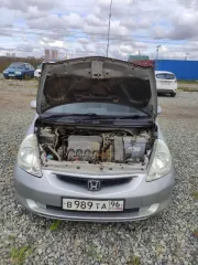 Honda Fit 2004 года, 86 л.с., пробег 300000 км, АКПП. Цвет серый. VIN отсутствует. ПТС 25ТО374964, госномер В989ТА96. Модель двигателя L13A, бензиновый, номер 1855928, мощность 86 л.с., объем 1339 куб. см. Номер кузова GD1-2033176. Экологический класс второй. Разрешенная максимальная масса 1275 кг…