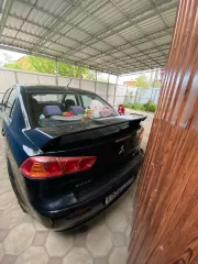 Легковой автомобиль, марка: Mitsubishi, модель: Lancer, год изготовления: 2008, цвет: черный, VIN: MBSTCY4A8U018403, ПТС: 78 УВ 476075, г/н: Е552ТТ193, мощность двигателя, л. с. (кВт): 150, разрешенная максимальная масса 1915 кг, масса без нагрузки 1537 кг. Находится в совместной собственности с…