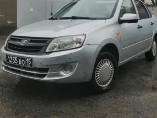 LADA Granta 2014 года выпуска, VIN: ХТА219060E0250266. Мощность двигателя: 81,6 л.с., объем двигателя: 1596 см³, пробег: 263867 км. Легковой автомобиль.