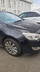 Opel Astra 2011, 115 лс, 196000 км. Автомобиль OPEL ASTRA, VIN XUFPE6DD3C3002173, кузов № XUFPE6DD3C3002173, цвет — черный металлик, год выпуска - 2011.