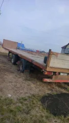 Schmitz SPR24, 1991 полуприцеп с бортовой платформой Schmitz SPR24, 1991 года выпуска; государственный регистрационный знак АУ158355; шасси №: 050257